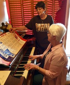 Malvern Historical Society Treasurer Linda Byrd (seated at piano) will be treating guests to live 1940's and 50's music at the keyboard. Society Secretary Sonia Strock is pictured looking on. 